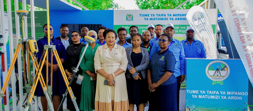 Baadhi ya Watumishi wa Tume wakiwa katika picha ya pamoja kwenye banda la Tume mara baada ya uzinduzi wa Sera ya Taifa ya Ardhi uliofanyika katika ukumbi wa Jakaya Kikwete Convention Centre Jijini Dodoma, 17/03/2025